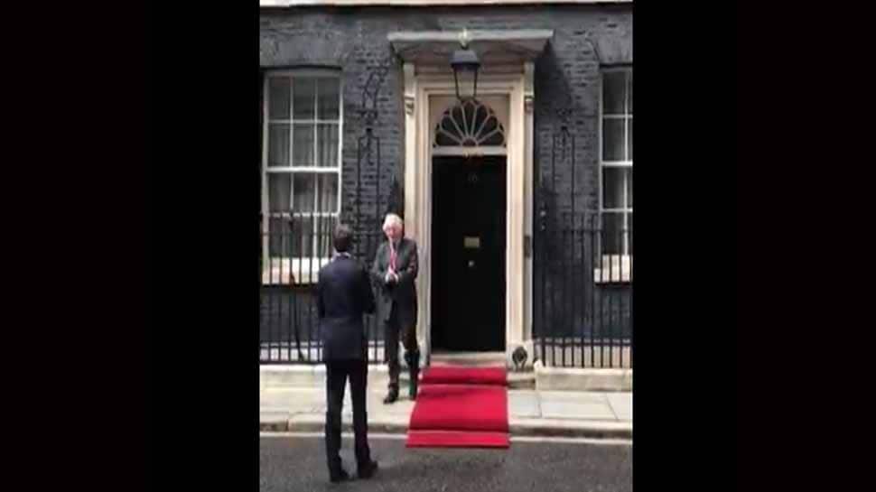 UK PM Boris Johnson and France President Emmanuel Macron&#039;s &#039;namaste&#039; as they meet in London
