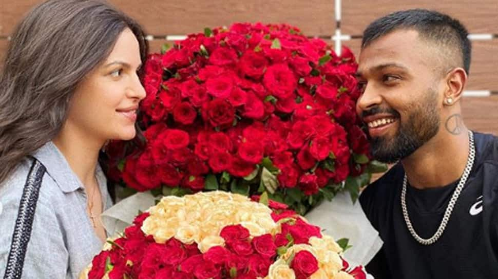 Preggers Natasa Stankovic and beau Hardik Pandya soak in love with a bouquet of red roses, pics go viral!