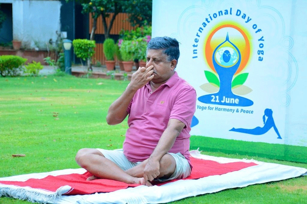 Ravi Shankar Prasad performs yoga on the occasion of  International Yoga day 