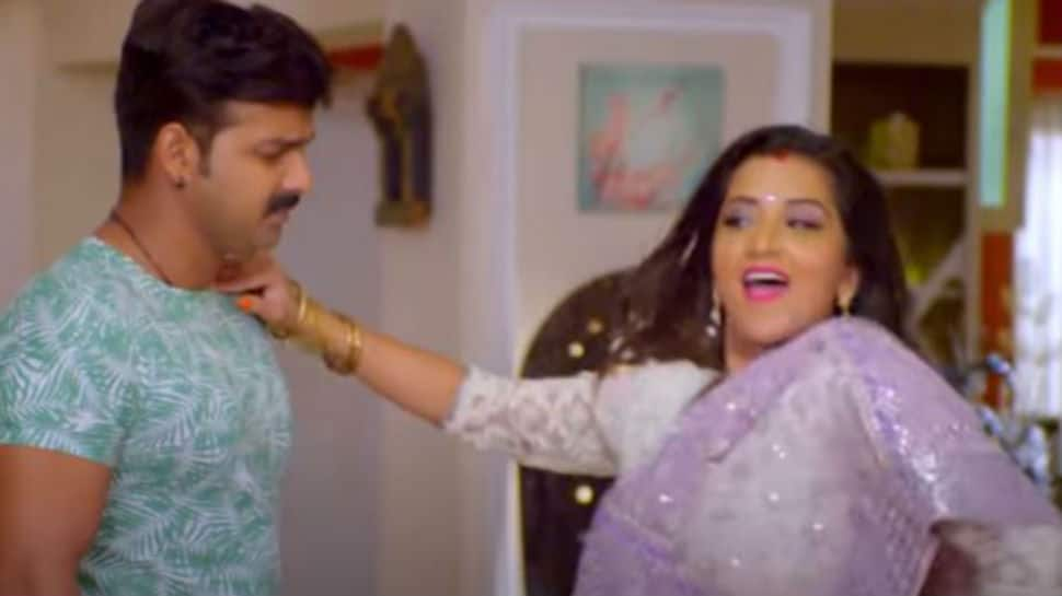 Bhojpuri bombshell Monalisa&#039;s sizzling dance moves and her chemistry with Pawan Singh in &#039;Shikhahar Per&#039; rocks YouTube