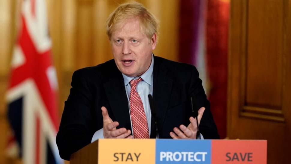 Behave yourselves, UK PM Boris Johnson warns as pubs get ready to pull pints again