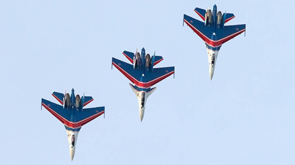 Sukhoi Su-27s, Su-30SMs, Su-35Ss of Russian Knights perform aerobatic displays near Moscow