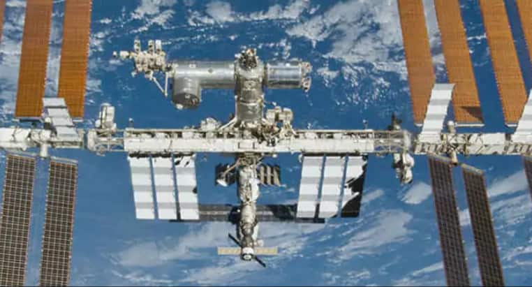 Spacewalking astronauts closing in on final battery swaps outside International Space Station