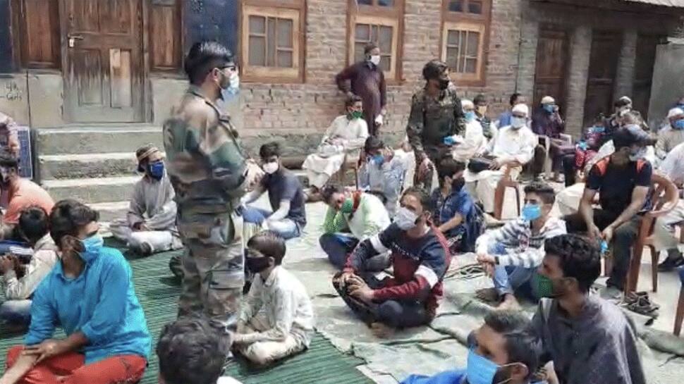 Indian Army conducts awareness campaign on coronavirus in Kashmir&#039;s Shopian, people laud effort