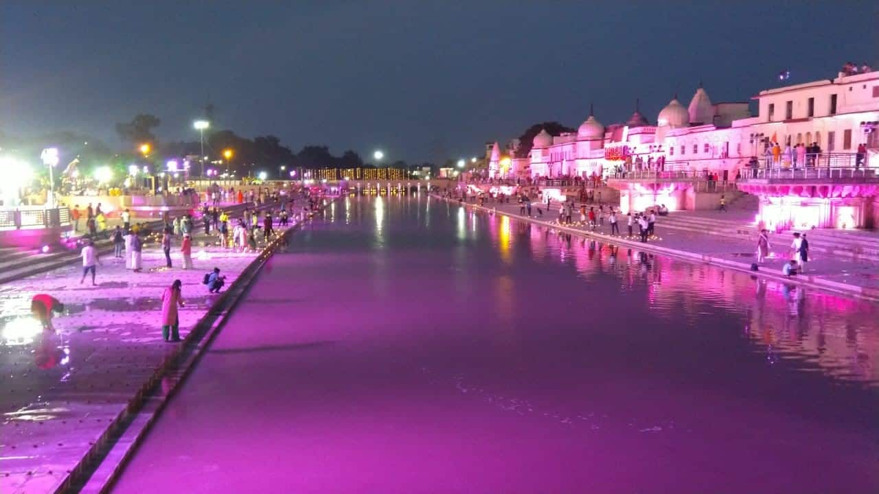 Devotees seen lighting diyas at the banks of Saryu river