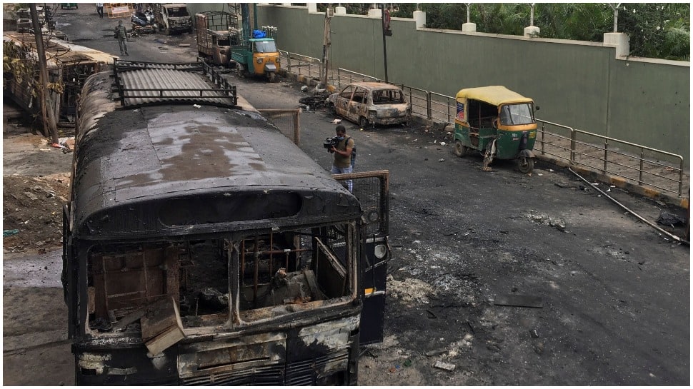 Photo of bus burnt by mob