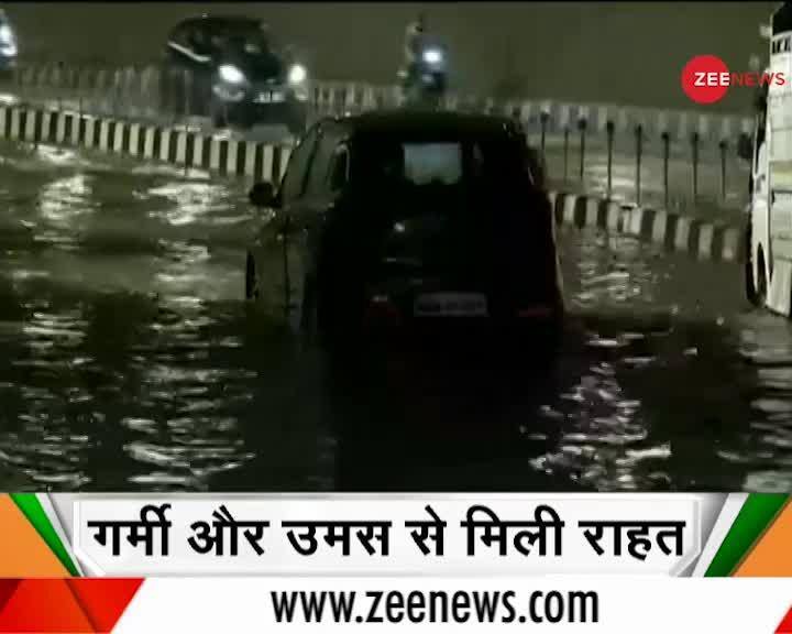 Heavy rain in Delhi brings relief from sultry weather Zee News