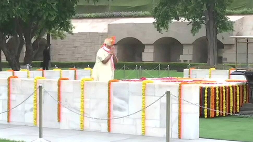 Prime Minister Narendra Modi pays floral tribute at Rajghat