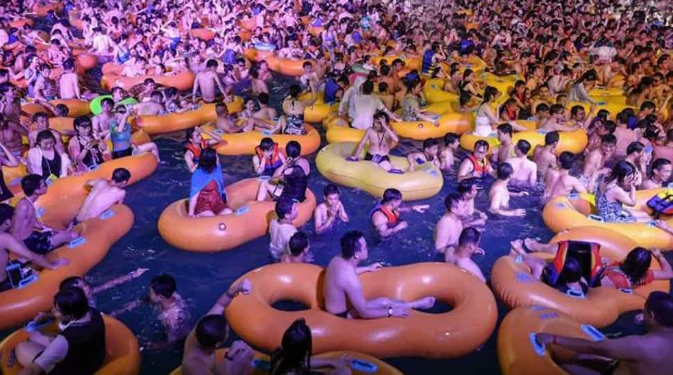 Hundreds of Chinese party at Water Park in COVID-19 epicentre Wuhan without face masks - Watch