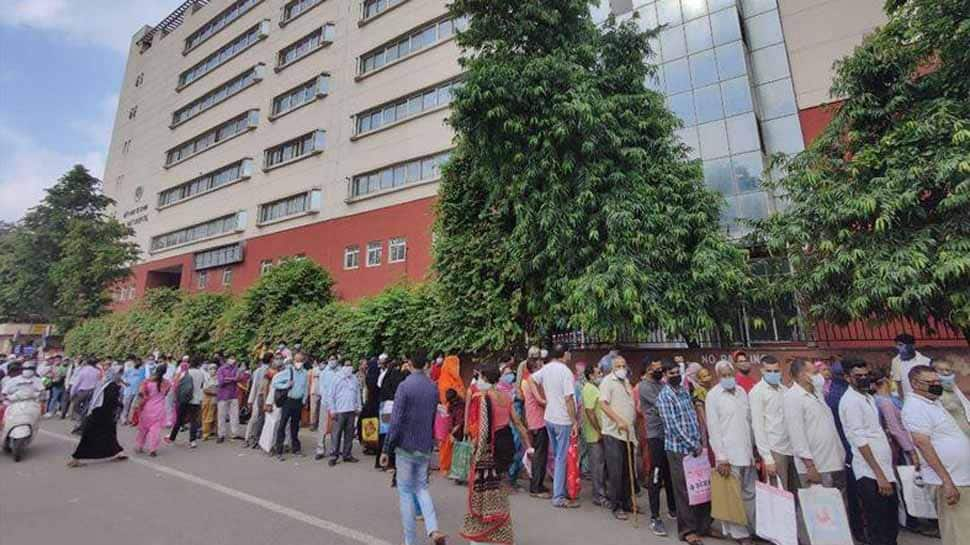 Long queues outside hospitals in Delhi, social distancing rules flouted amid spike in COVID cases