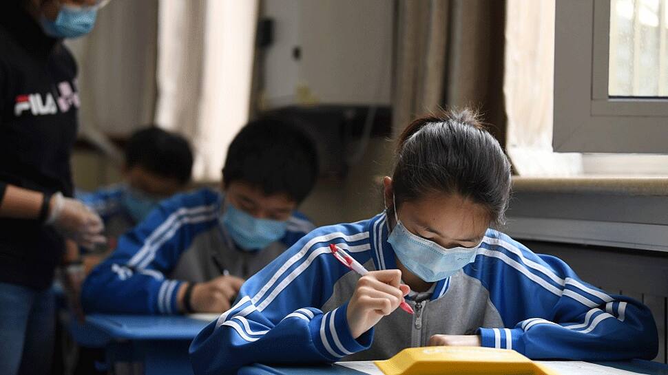 First batch of Beijing students resumes classes