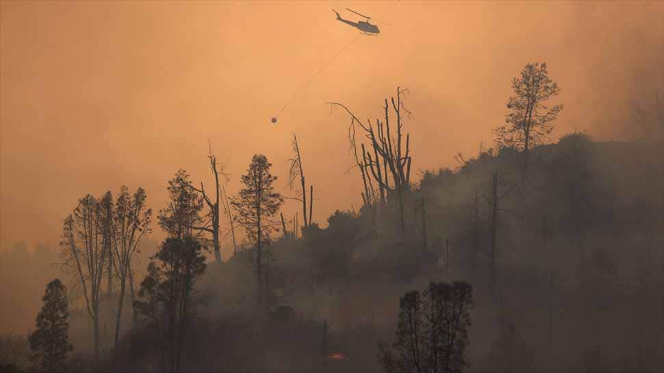 Wildfires rage across US Northwest, California governor blames climate change