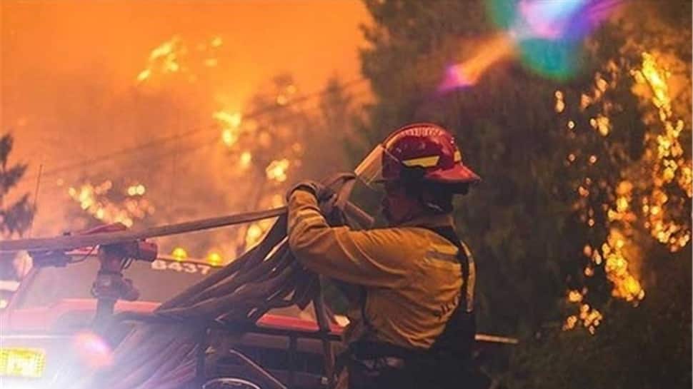 Better weather helps firefighters battling against deadly wildfires in Oregon, California