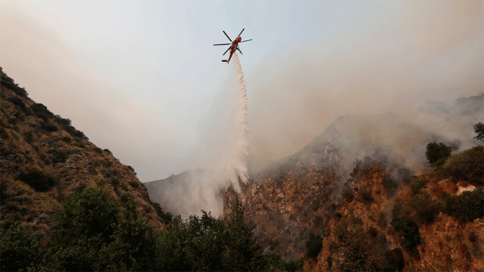 Firefighters continue to battle California wildfire, 35 dead, 50 missing; thousands forces to flee homes