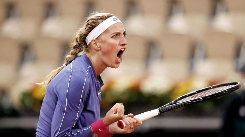 Kvitova and Siegemund move into last eight at French Open