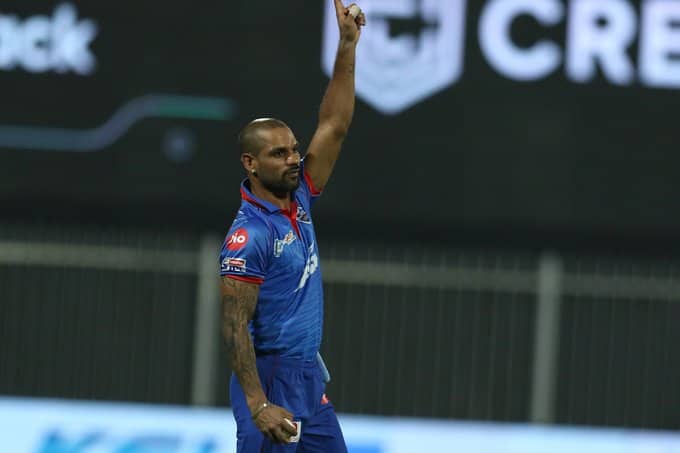 Dhawan grabs a stunner to remove Buttler