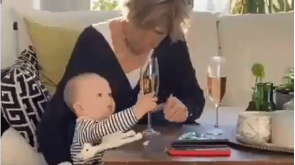 Fizz over kid! Video of elderly woman letting toddler fall to save drink goes viral