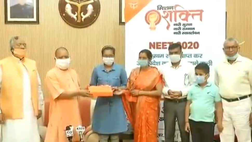 UP CM Yogi Adityanath felicitates NEET topper Akanksha Singh, says govt will bear her education expenses