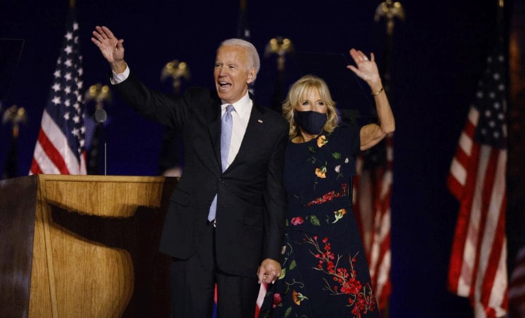 Joe Biden greets the crowd with wife after win