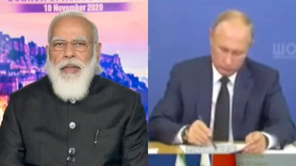 Russian President Vladimir Putin takes note as PM Narendra Modi speaks at SCO meet in front of Chinese President Xi Jinping