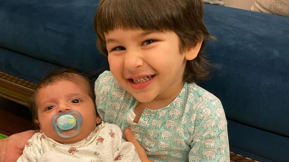 Taimur Ali Khan cradles his little friend with a million-dollar smile in this viral pic - Check out!