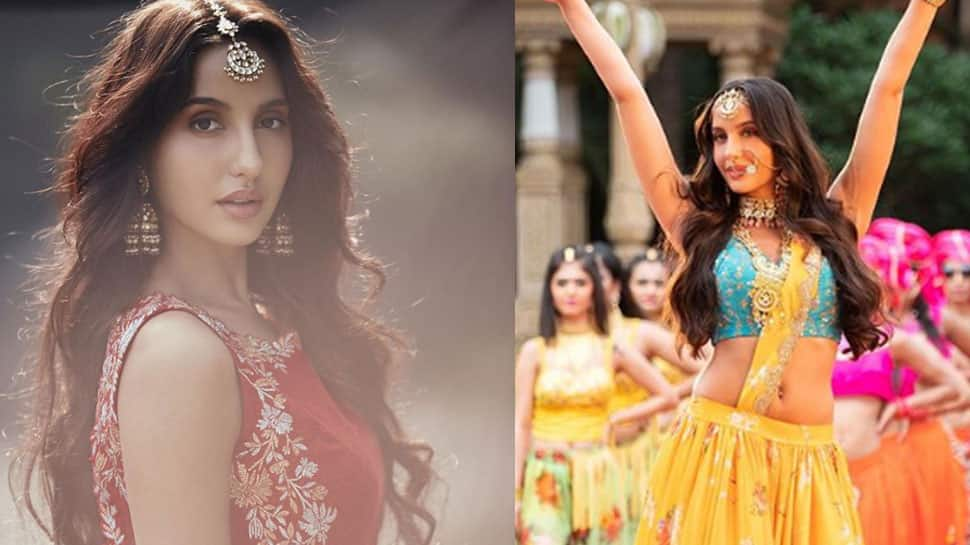 Dear Nora Fatehi, stop making mortals go crazy with your pics in a designer saree! 