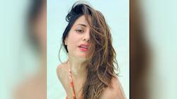 On a sunny day in Maldives, Hina raises the temperature with her bold avatar