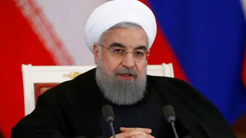 Iran President Hassan Rouhani defends execution of dissident journalist