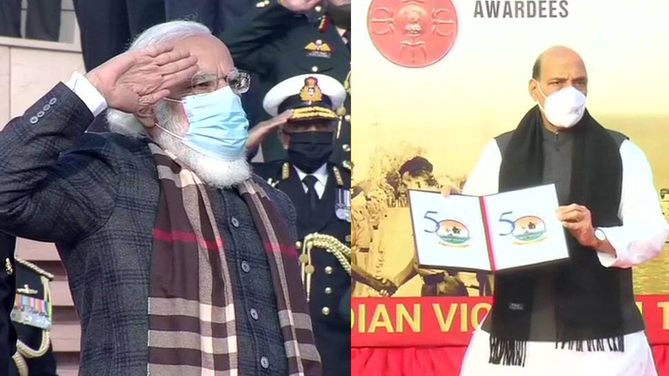 Vijay Diwas: PM Narendra Modi lights up &#039;Swarnim Vijay Mashaal&#039;, Rajnath Singh unveils logo for `Swarnim Vijay Varsh`