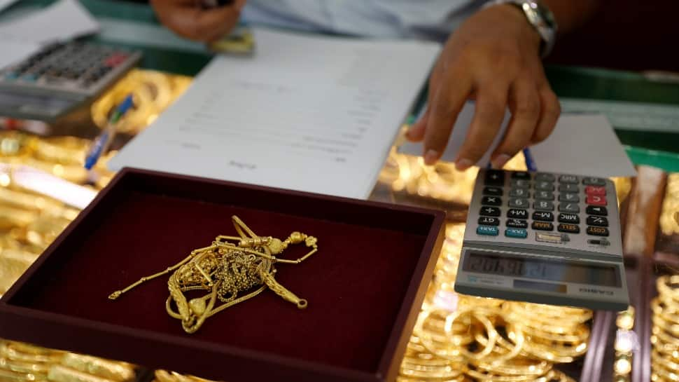 Gold rises Rs 514 to Rs 50,297 per 10 gram; silver zooms by Rs 2,249