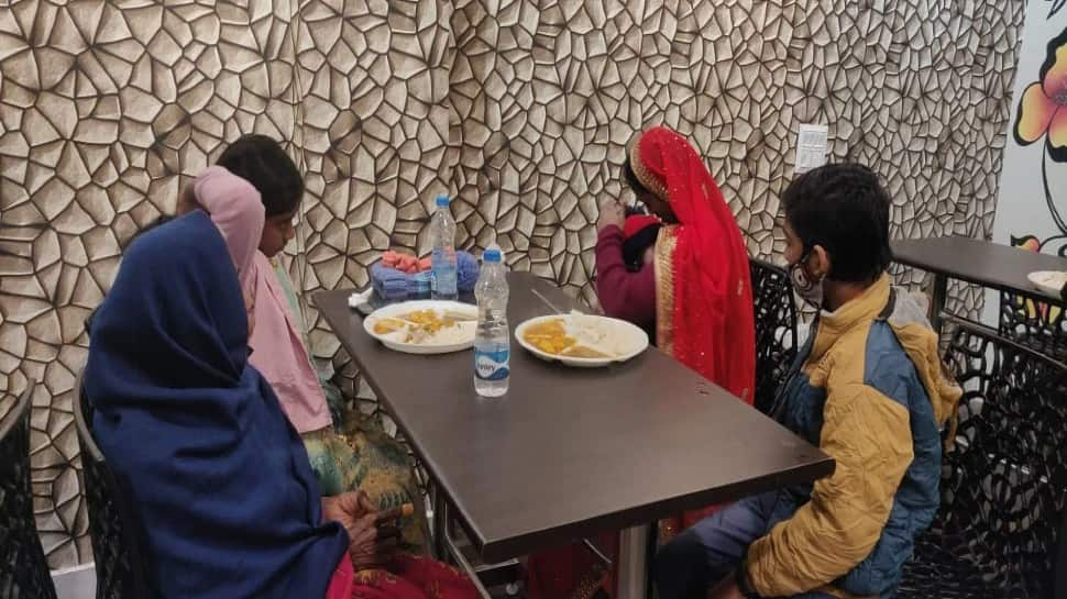 The shop is furnished with tables and chairs for Baba's customers