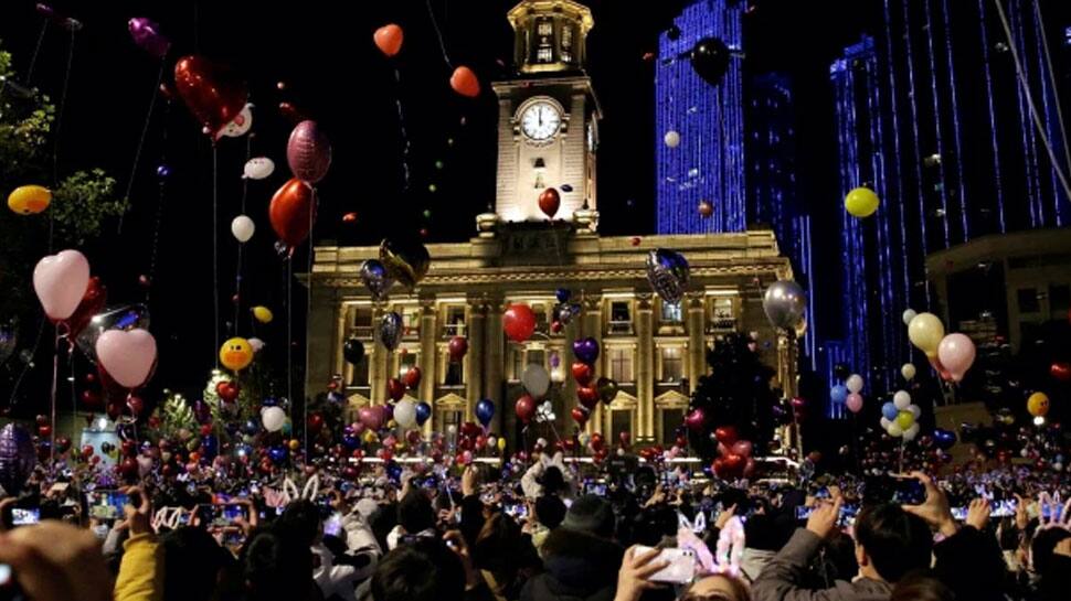 Wuhan, once world’s COVID-19 epicenter, celebrates 2021 with large crowds