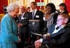Stephen Hawking got to meet Britain's Queen Elizabeth during a reception at St. James Palace in London