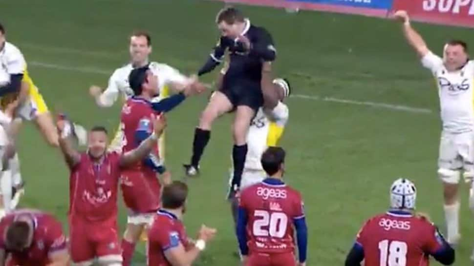 Rugby referee sends player off for lifting him up in wild celebration; watch video