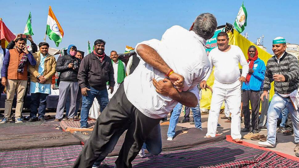 Farmers enjoy a game of wrestling on the Delhi borders.