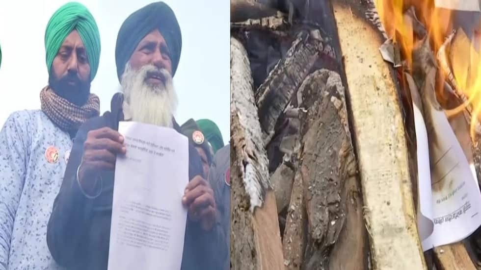 Protesting farmers burn copies of three farm laws, shout anti-govt slogans  at Delhi borders | India News | Zee News