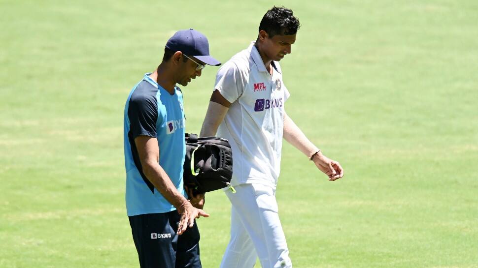 Indian paceman Navdeep Saini walks off the field with a groin injury. (Photo: BCCI)