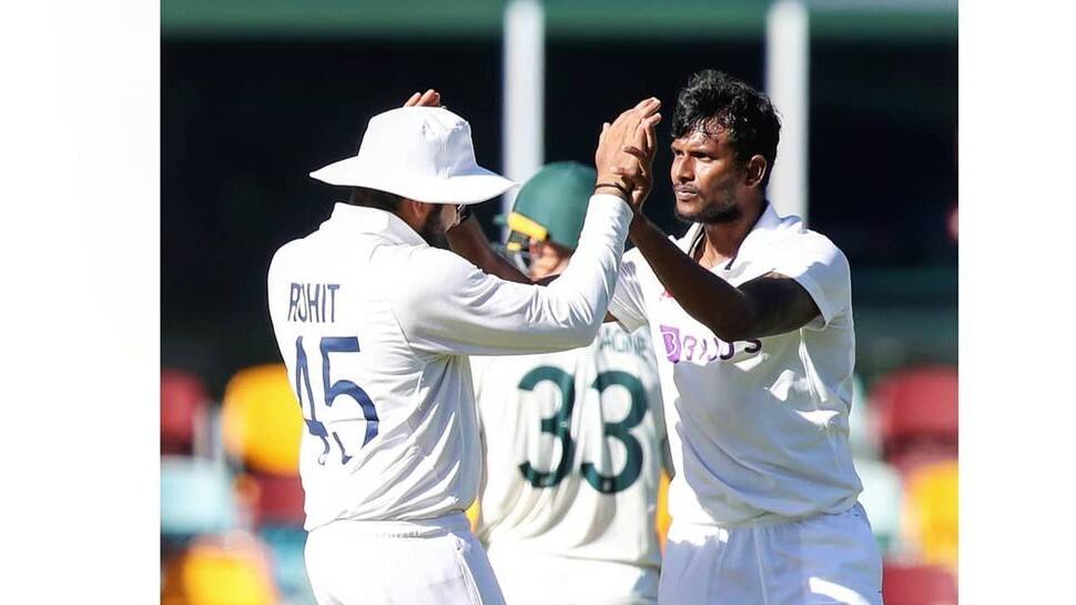 Teammates congratulate T. Natarajan after he picked up the wicket of Marnus Labuschagne. (Photo: BCCI)