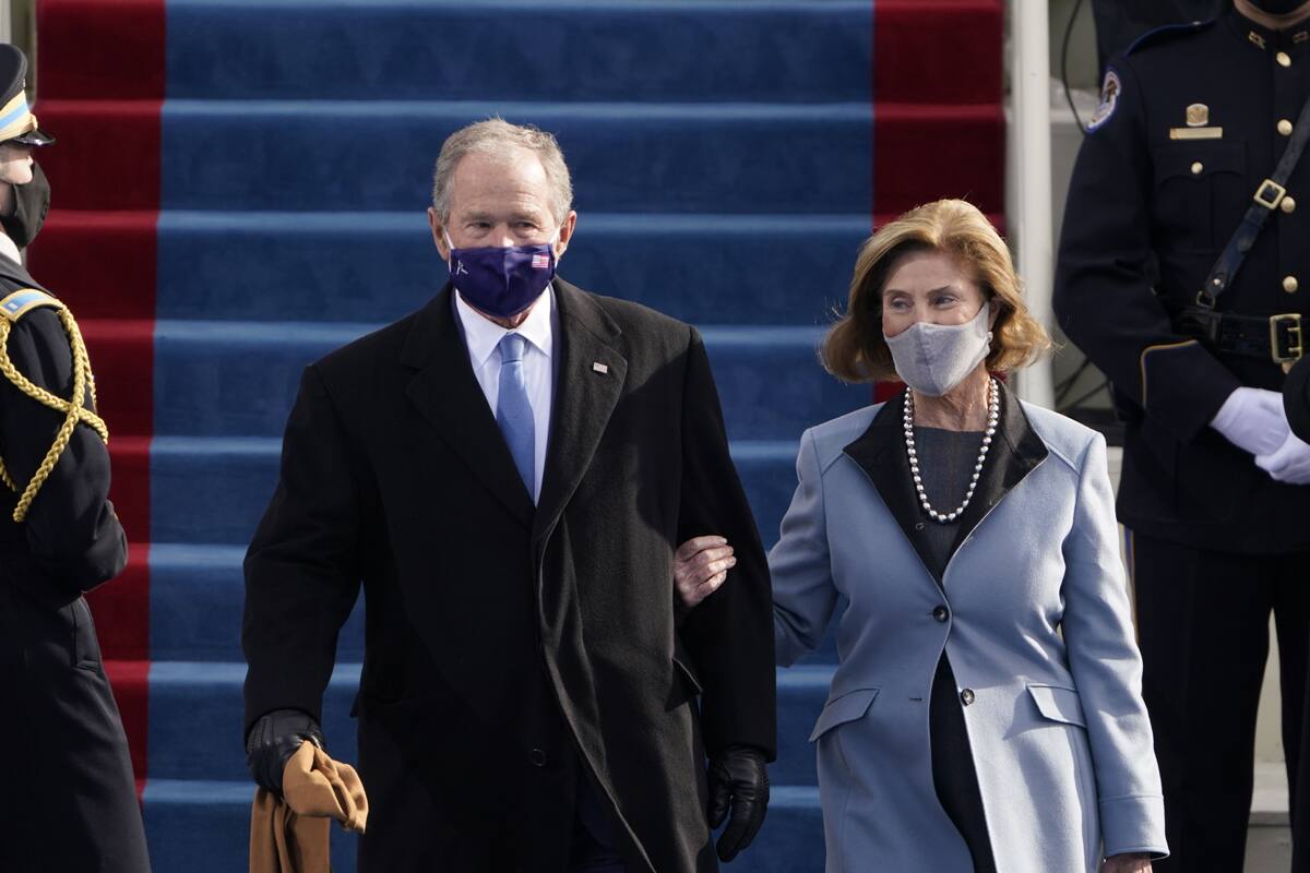 George W Bush and his wife Laura 