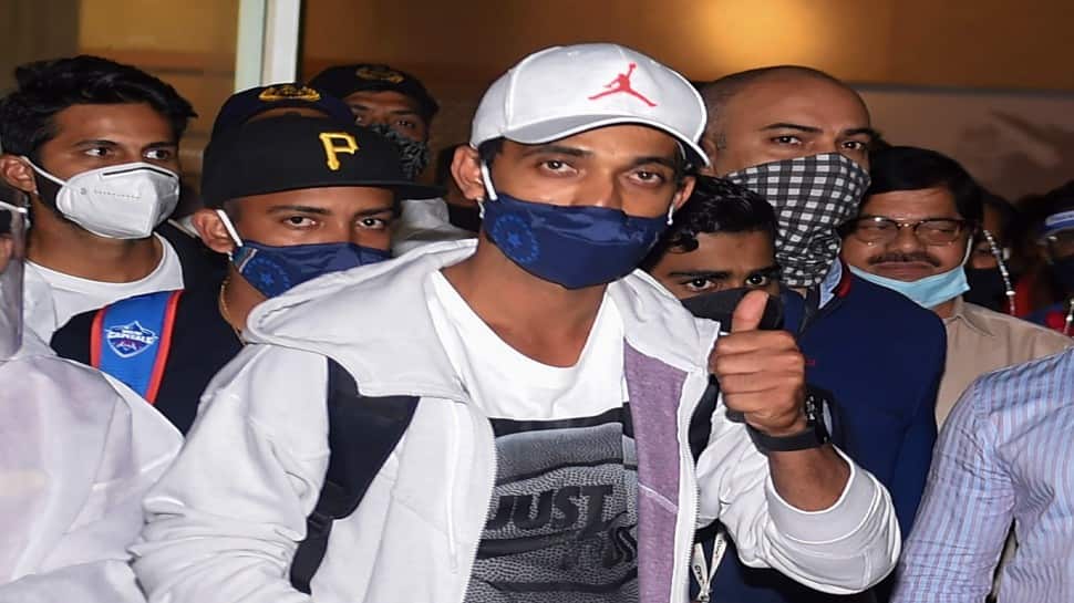 Ajinkya Rahane acknowledges the cheers of the crowd outside the airport on his arrival in Mumbai. (Photo: PTI) 