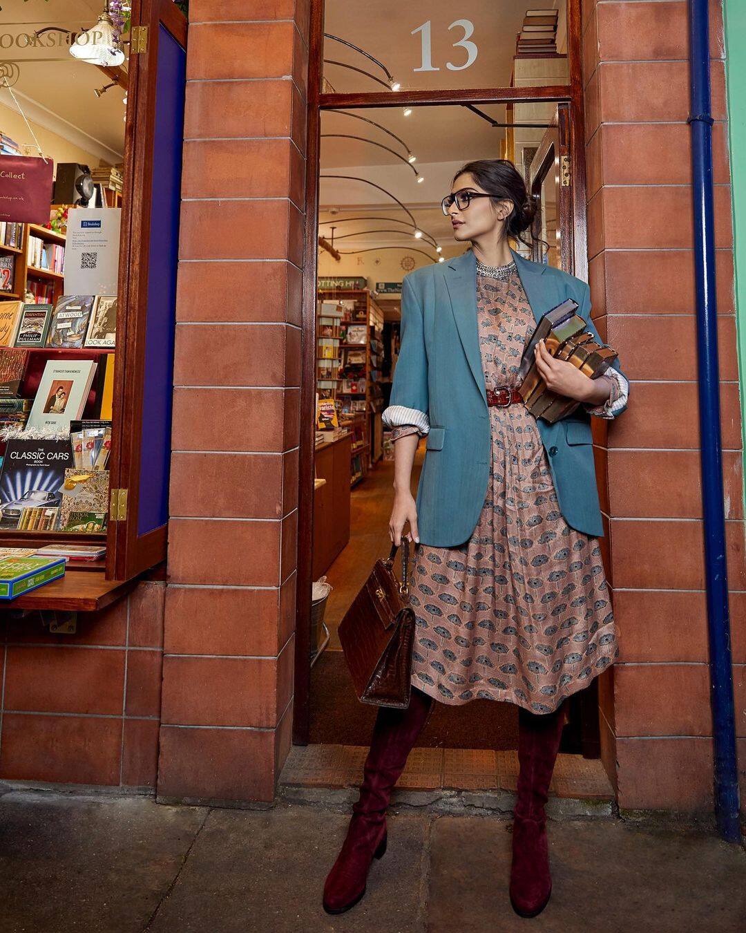 Sonam steps out to buy books in a beautiful blue jacket