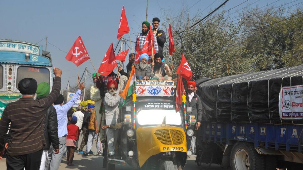 Farmers block a road at Singhu border.