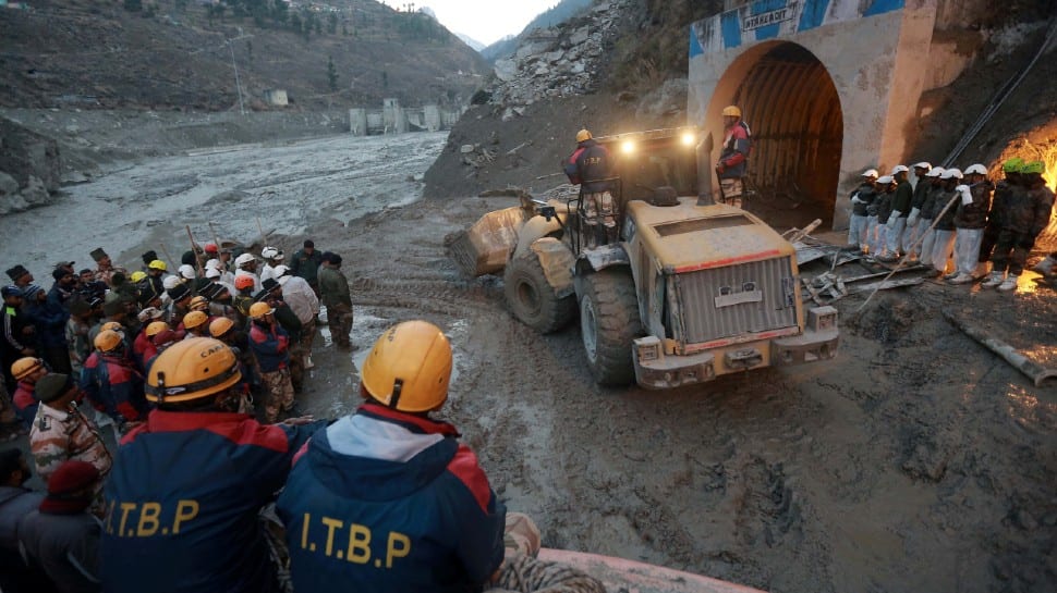 Heavy machinery had to be used on ground to clear a tunnel