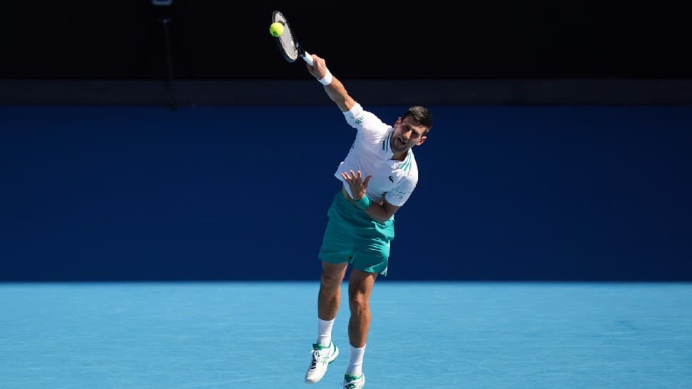 Serbia's Novak Djokovic returns to Francis Tiafoe of the USA in their second-round match at Australian Open 2021. (Source: Twitter)