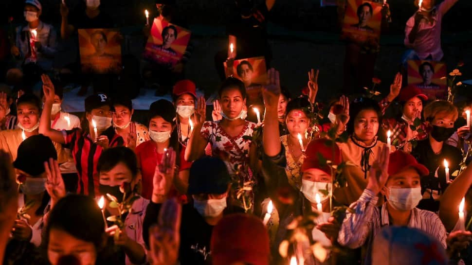 A group on protestors mourn the death of those killed by the military