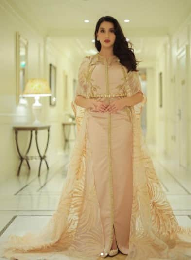 Nora looks graceful in baby pink lehenga