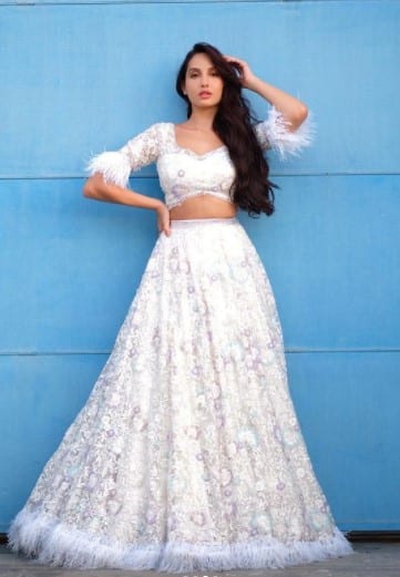 Nora looks ethereal in this white lehenga