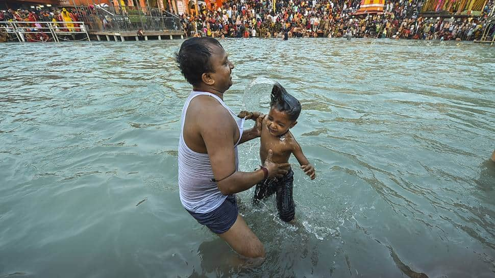 Devotees participate in Shahi Snan