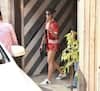 Jacqueline sizzles in red gym wear