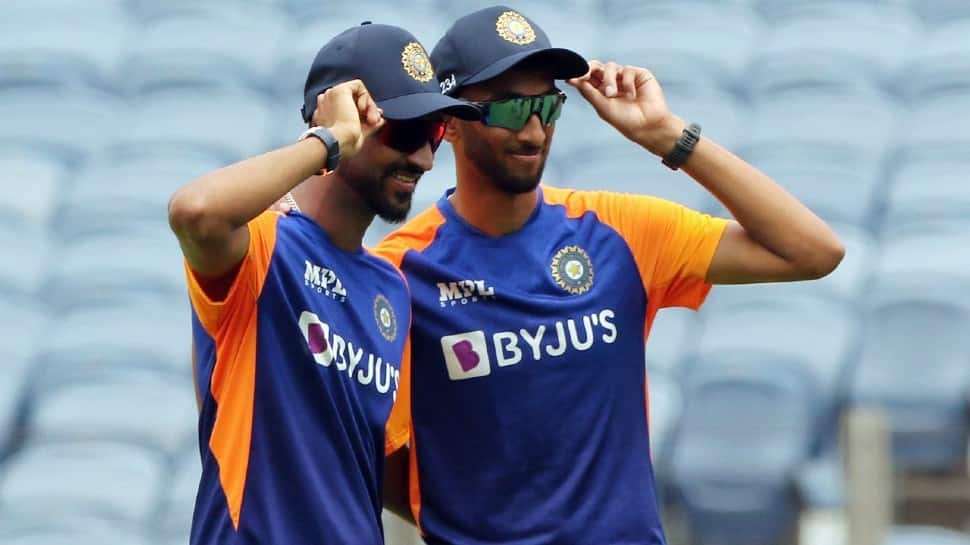Krunal Pandya (left) poses with the other Indian debutant Prasidh Krishna ahead of the first ODI against England in Pune. (Photo: ANI)